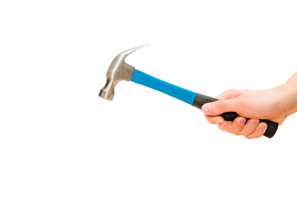 istock Hand holding hammer in action. 844621456