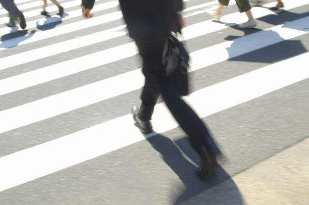 istock Businessman walking in crosswalks 844626220