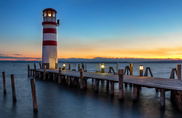 istock Bright beautiful sea sunset panorama above the beacon tower 844633268