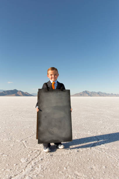 istock Business Boy with Sandwich Message Board 844638540