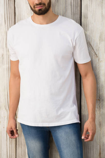 istock Man posing against wooden wall 844644184
