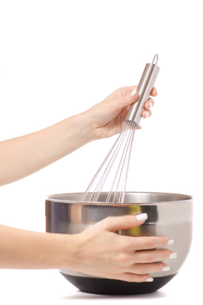 istock Female hand kitchen whisk bowl 844644660