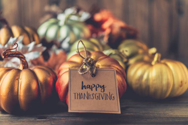 Thanksgiving background with metallic pumpkins