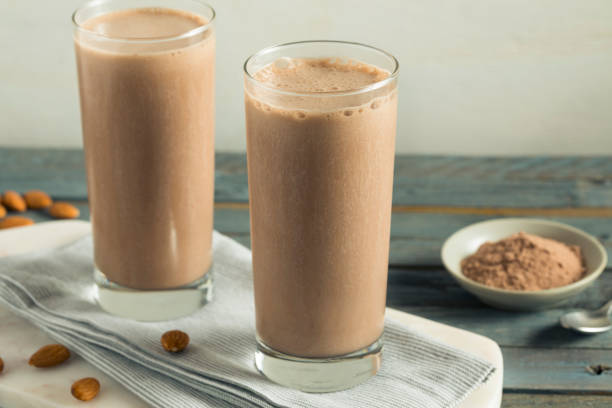 Healthy Homemade Chocolate Protein Shake Healthy Homemade Chocolate Protein Shake with Almond Milk chocolate shake stock pictures, royalty-free photos & images