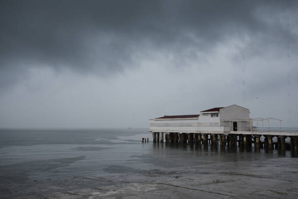 istock storm at the pier on the sea, thundercloud 844656588