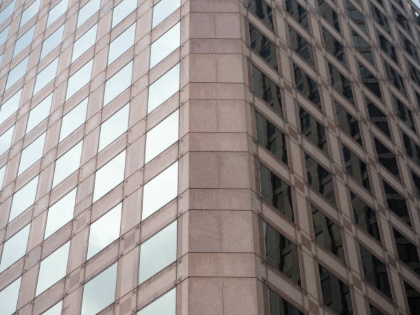 istock Highrise office building in San Francisco half the windows reflect a cloudy sky 844662974