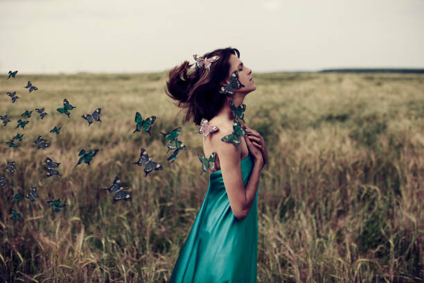 istock Woman with butterfly 844670486