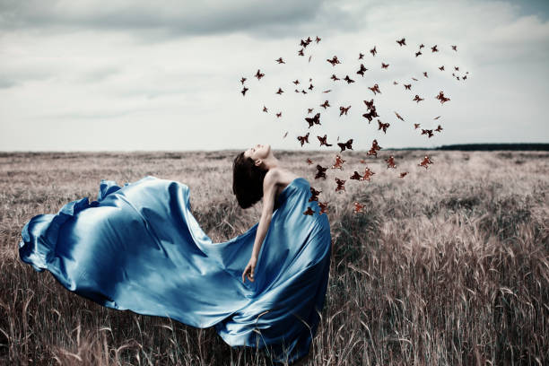 istock Woman with butterfly 844670508