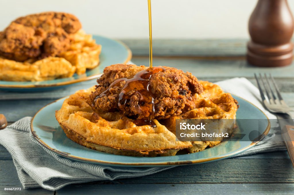 Homemade Southern Chicken and Waffles Homemade Southern Chicken and Waffles with Syrup Waffle Stock Photo
