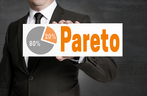 Pareto sign is held by businessman.