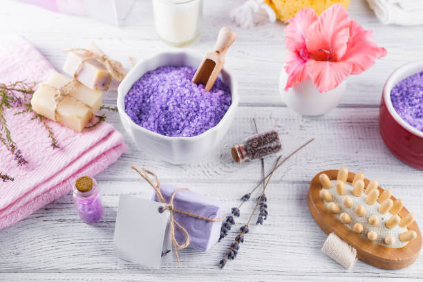 istock Wellness setting. Sea salt in bowl, towels, 844686384