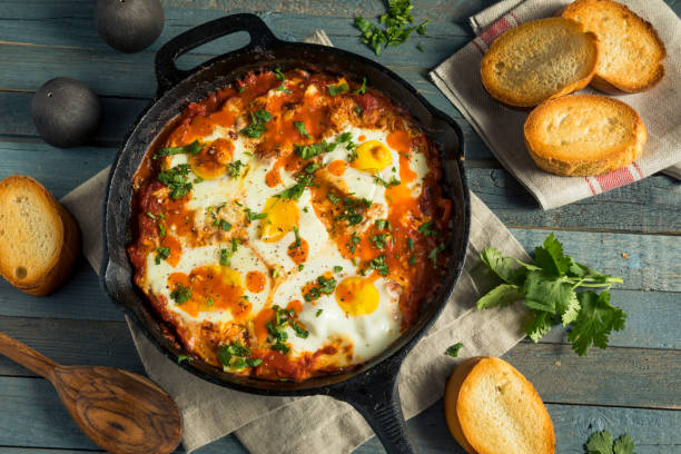istock Homemade Saucy Shakshuka with Eggs 844710472