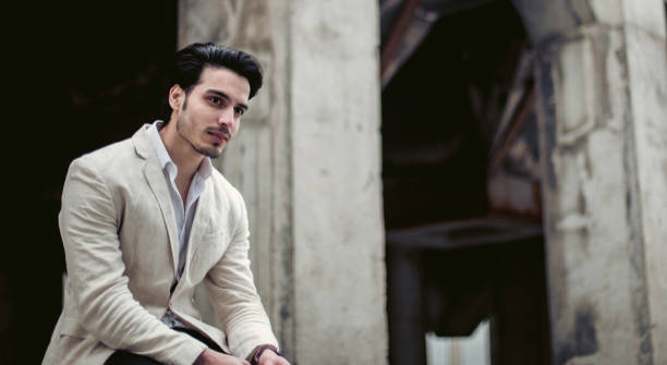 istock Handsome businessman sitting outdoors 844749802