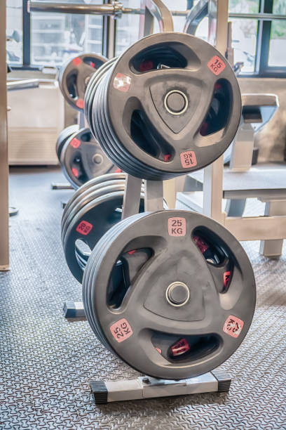 istock Interior of new modern gym with equipment. 844750492