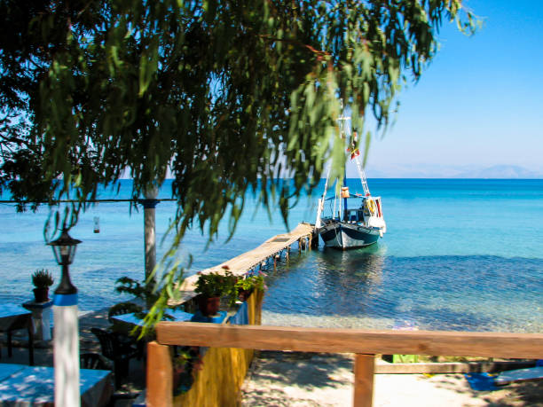 istock Sailboat on the dock in tropical sea. 844784538