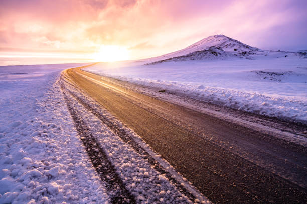 Winter sunset view on the road trip Winter sunset view on the road trip snow sunset winter mountain stock pictures, royalty-free photos & images