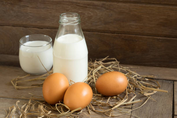 Eggs with bottle and glass milk.