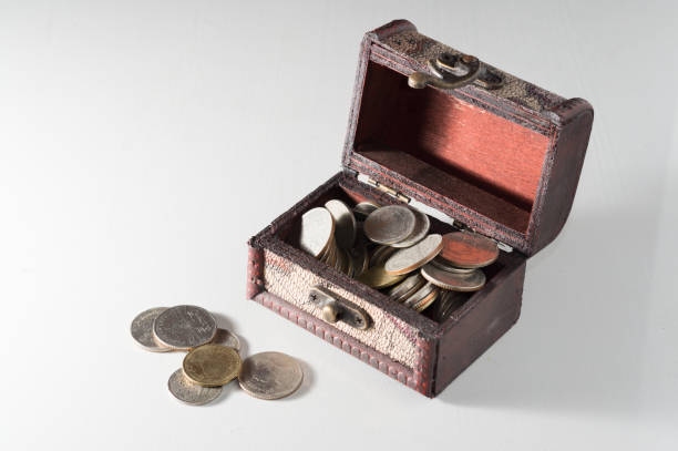 Money coin in chest on table. Money coin in chest on table,business object. open gold ira stock pictures, royalty-free photos & images