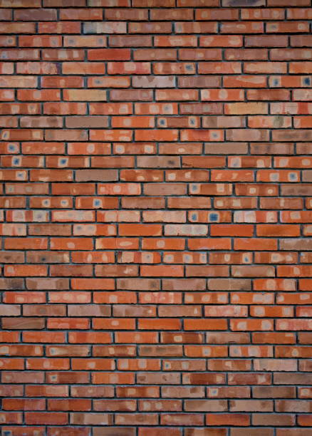 istock Texture of old red brick wall surface with cement and concrete seams 844821406