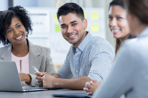 istock Handsome businessman participates in meeting 844821994