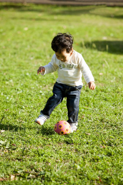 istock Children play with a ball 844827628