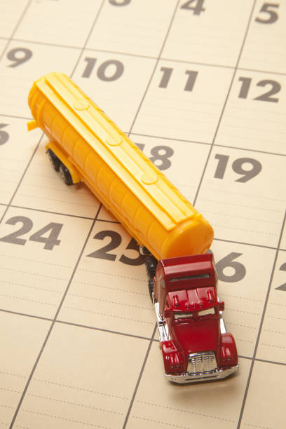 istock Tanker trucks and calendar 844864266