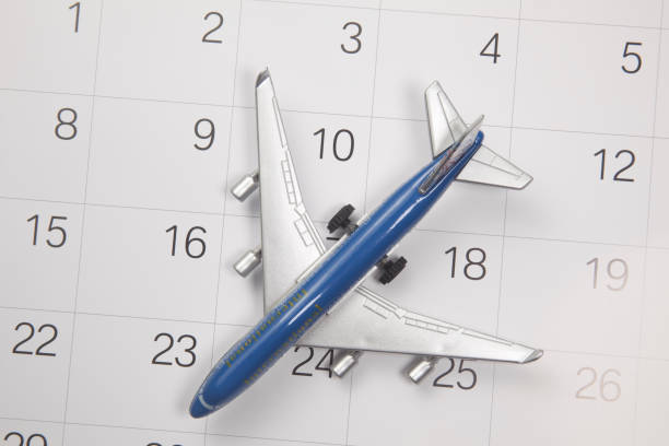 istock Toy plane and calendar 844864532