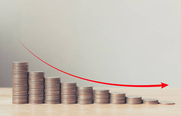 coin stack step down graph with red arrow, risk management business financial and investment, copy space - decline imagens e fotografias de stock