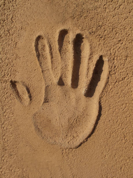 istock The hands of the wall 844900466