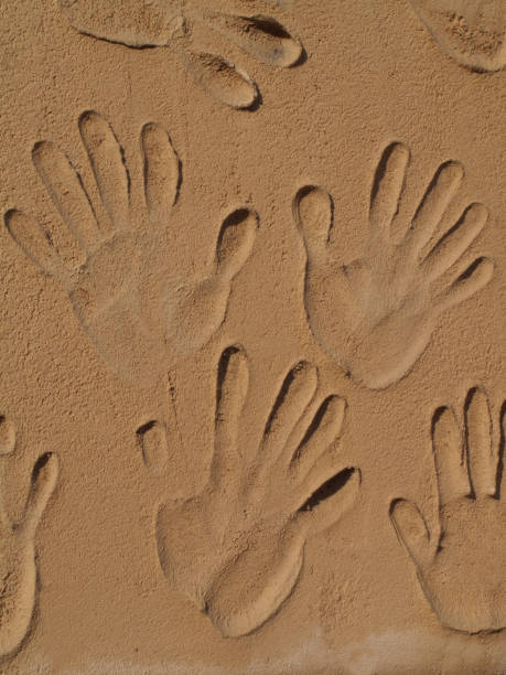 istock The hands of the wall 844900480