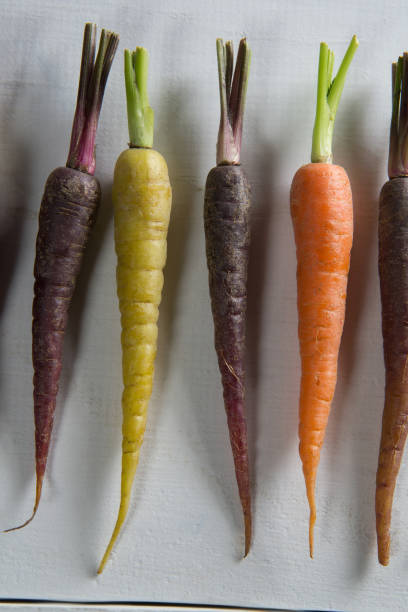 istock Overhead view of carrots arranged on table 844904662