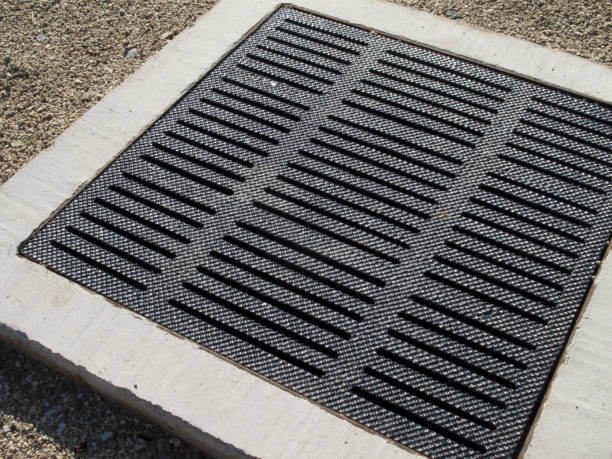 istock The drain on the road 844905458