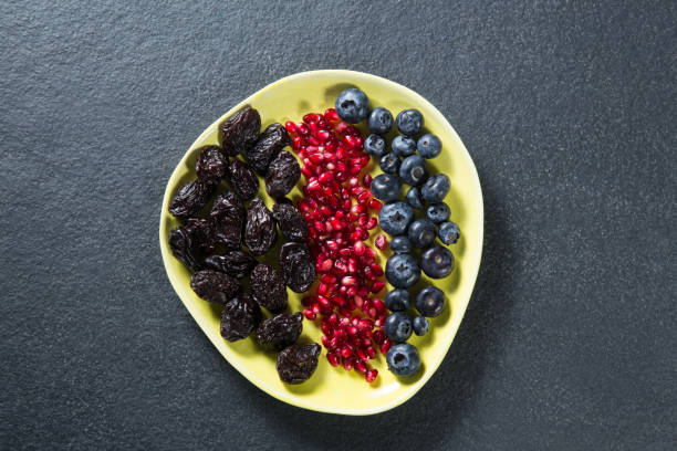 istock Overhead view of various fruits in plate 844914234