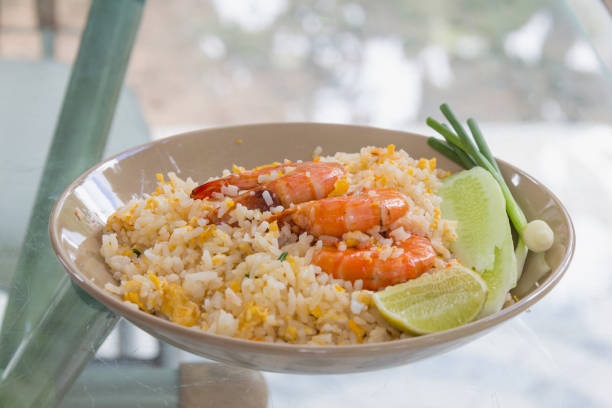 istock shrimp fried rice with cucumber slice,onion,lemon 844930940