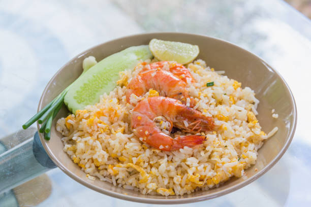 istock shrimp fried rice with cucumber slice,onion,lemon 844931448