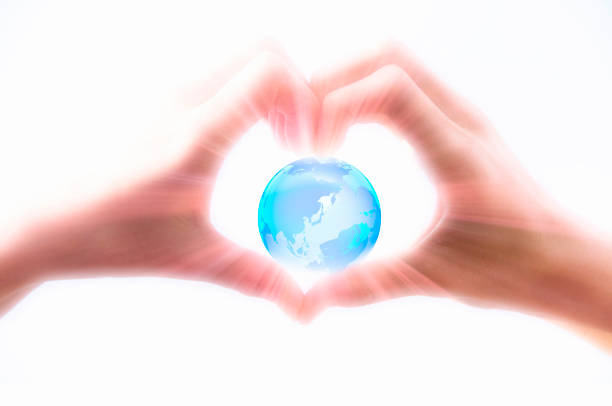 istock Earth in the heart in hand made 844932280