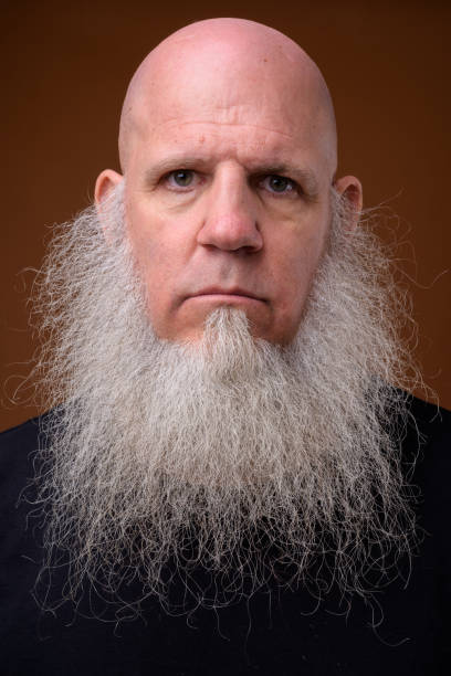 istock Portrait of bald man with long gray beard 844945318
