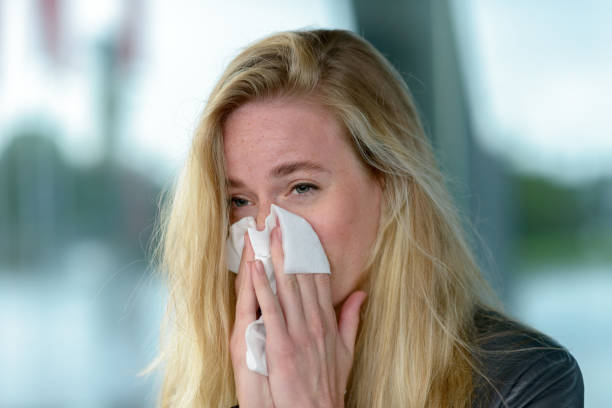 istock Young blond woman with hay fever 844945332