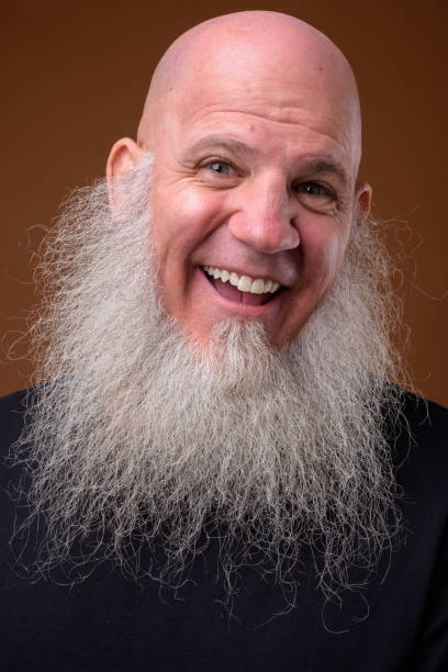 istock Portrait of bald man with long gray beard 844945534