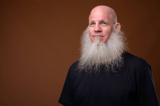 istock Portrait of bald man with long gray beard 844945770