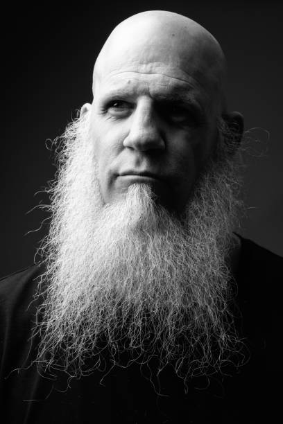 istock Portrait of bald man with long gray beard 844946704