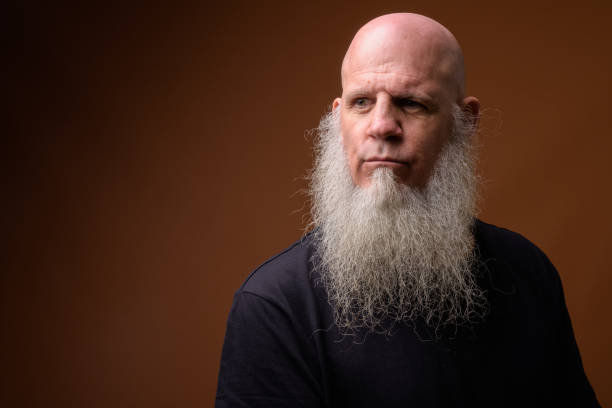 istock Portrait of bald man with long gray beard 844946752