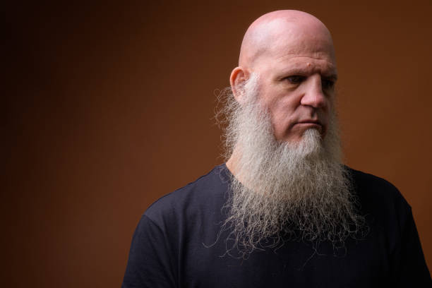 istock Portrait of bald man with long gray beard 844946756