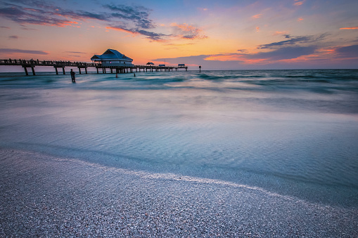 Sun setting over a vibrant horizon in the Clearwater beach, Florida