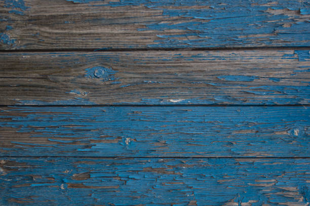istock Old wooden surface with exfoliating paint dark blue colour 1 845006370