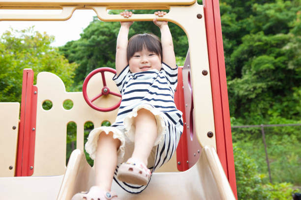 istock Girls playing in the Park 845006664