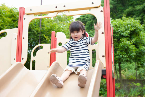 istock Girls playing in the Park 845006672