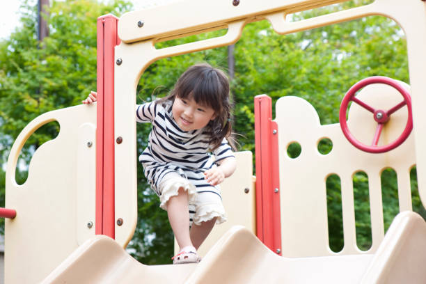 istock Girls playing in the Park 845006686