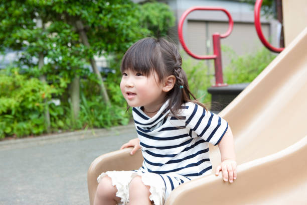 istock Girls playing in the Park 845006706