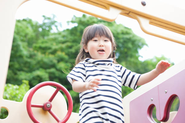 istock Girls playing in the Park 845006748